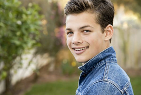 Teen boy smiling