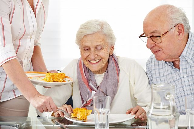 Elderly people eating